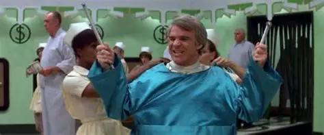 Steve Martin putting on a labcoat